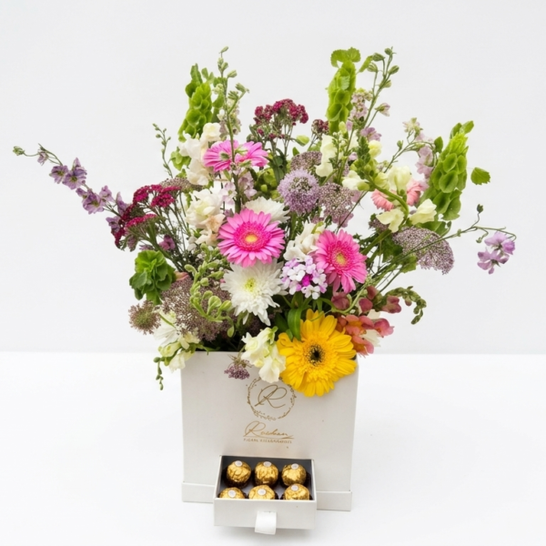 premium mix of Gerberas, Roses, and chocolates. The perfect luxury gift delivery in Egypt.
